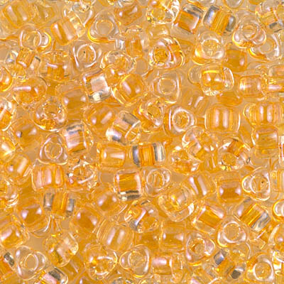 TR5-1107:  HALF PACK Miyuki 5/0 Triangle Apricot Lined Crystal approx 125 grams - TR5-1107_1/2pk